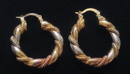 Tricolored Gold, Rose Gold and Silver twisted hoop fashion earrings.