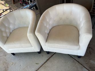 Pair of white armchairs