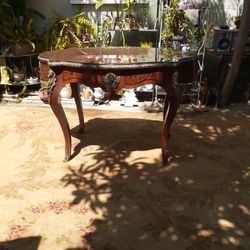 A French 19th century Louis XV. wood marquetry and ormolu  table

