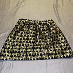 Crown & Ivy Elephant Print Skirt. Size 4 Black skirt with gold elephants. Subtle pleats in front.  Waistband with back invisible zipper hook and e