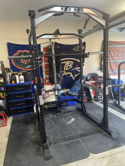 Fitness Reality cage and bench/ attachment and barbell. No Weights