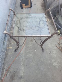 2 metal and glass tables