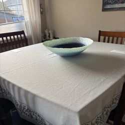 large decorative art glass centerpiece bowl with a crackle-textured surface and a beautiful aqua-to-deep-navy ombré interior