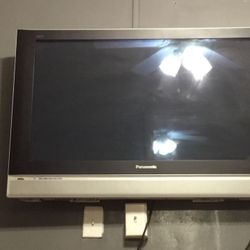Panasonic TV and base included