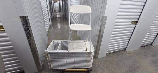 White folding chairs