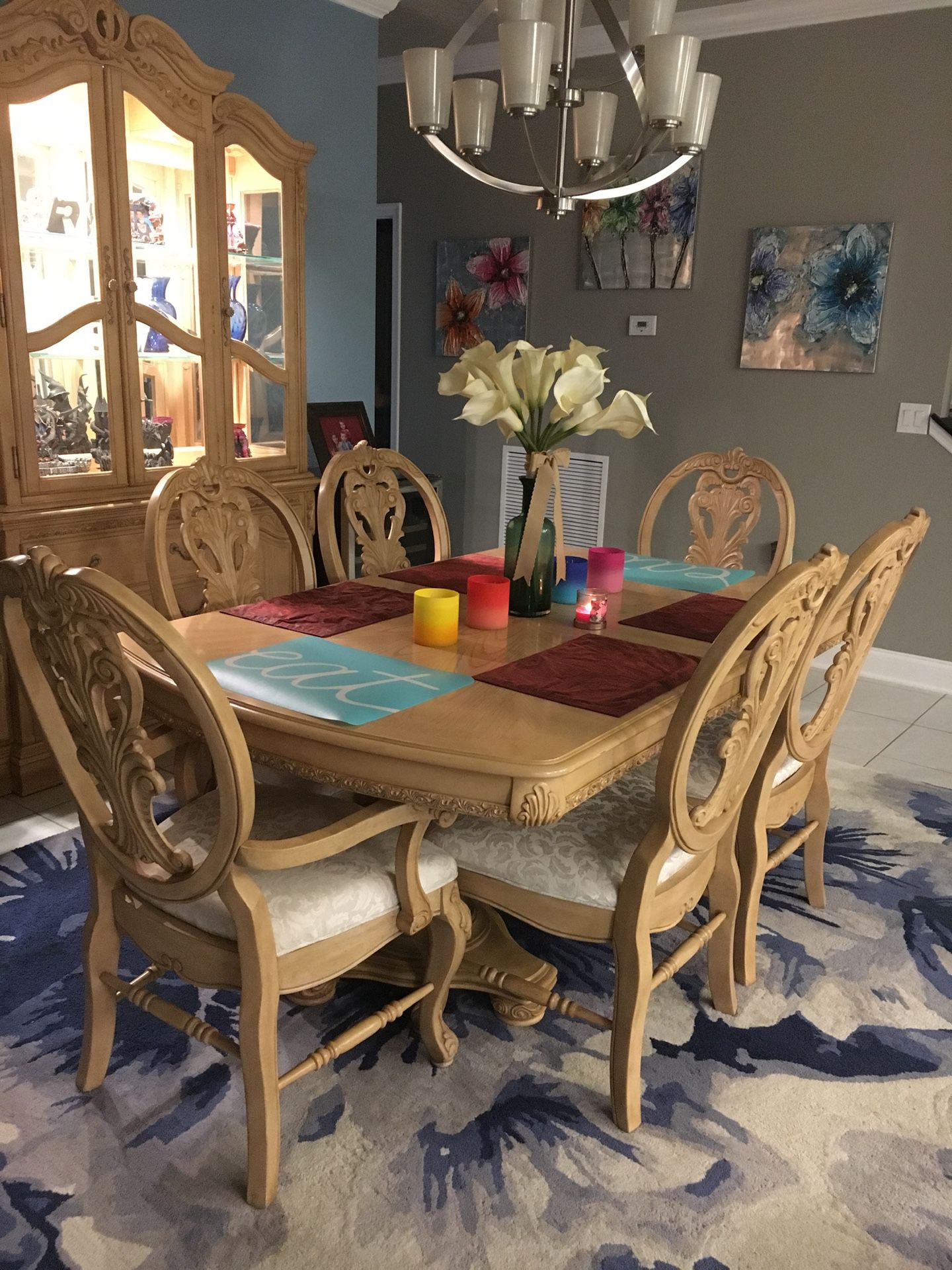 Dining room table and chairs and hutch set
