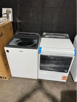 27” new top load washer Gas dryer