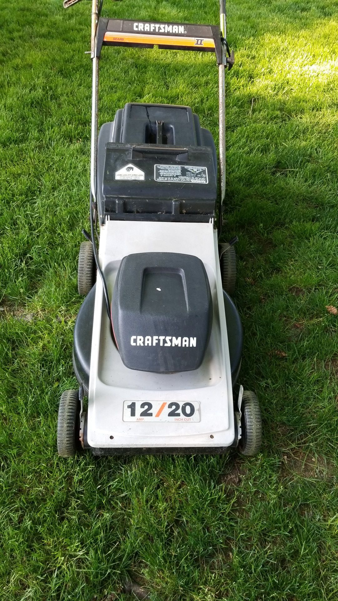 Craftsman electric corded lawnmower with bag.