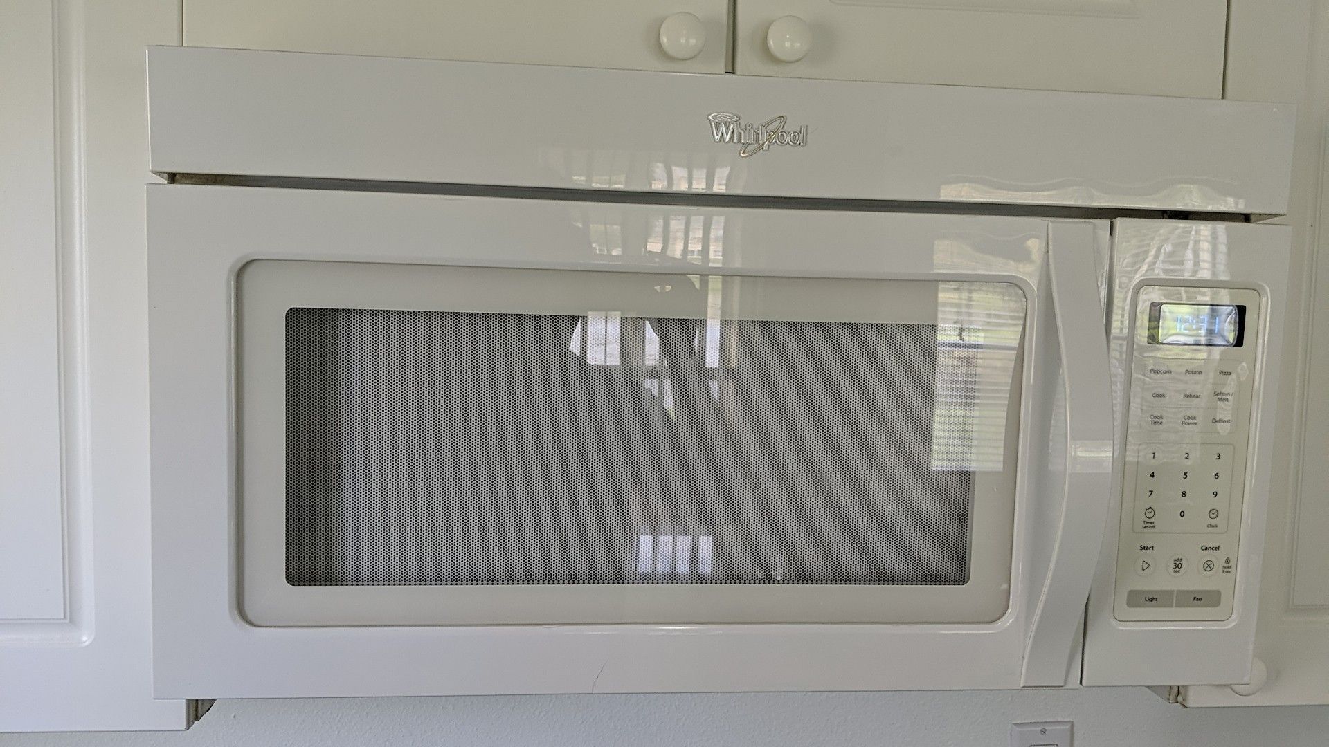 Whirlpool over the range microwave. Model W10451031A