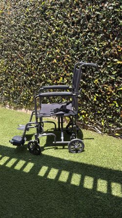 Transport wheelchair