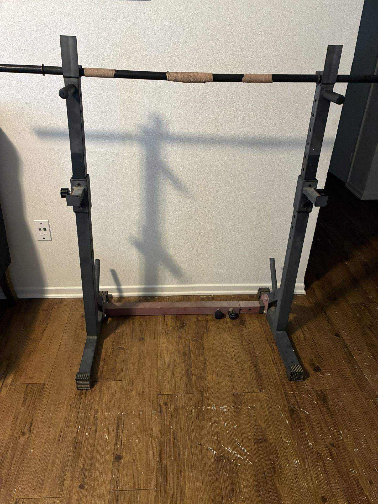 Squat/Bench Rack With Weights.