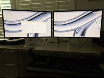 Apple Mac Studio and two Apple 27” Studio Displays