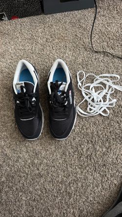 White and black Reebok size 8 men’s