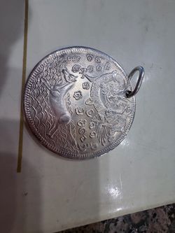 Silver Dragon Engraved Coin Pendant