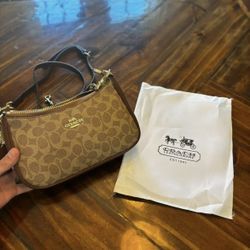 Coach Brown Logo Shoulder Bag with Gold Hardware and Leather Strap