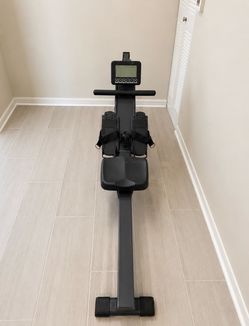 Rowing exercise machine