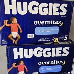 2 boxes of Huggies size 5