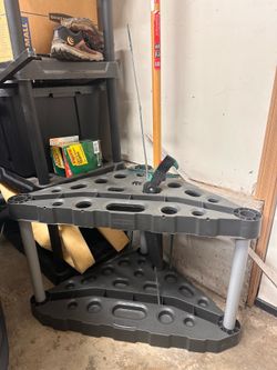 Rubbermaid plastic garage corner tool tower rack