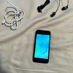 Grey iPhone 5 16 GB comes with free charger and earphones 