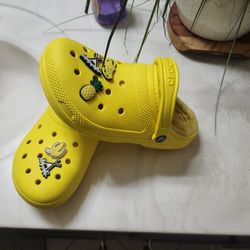 Yellow Crocs. 