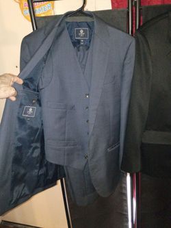 a three-piece suit and a dress suit