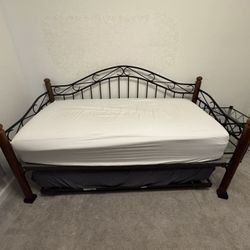 Iron Daybed With Trundle, 2 Twin Mattresses, And Iron Nightstand 