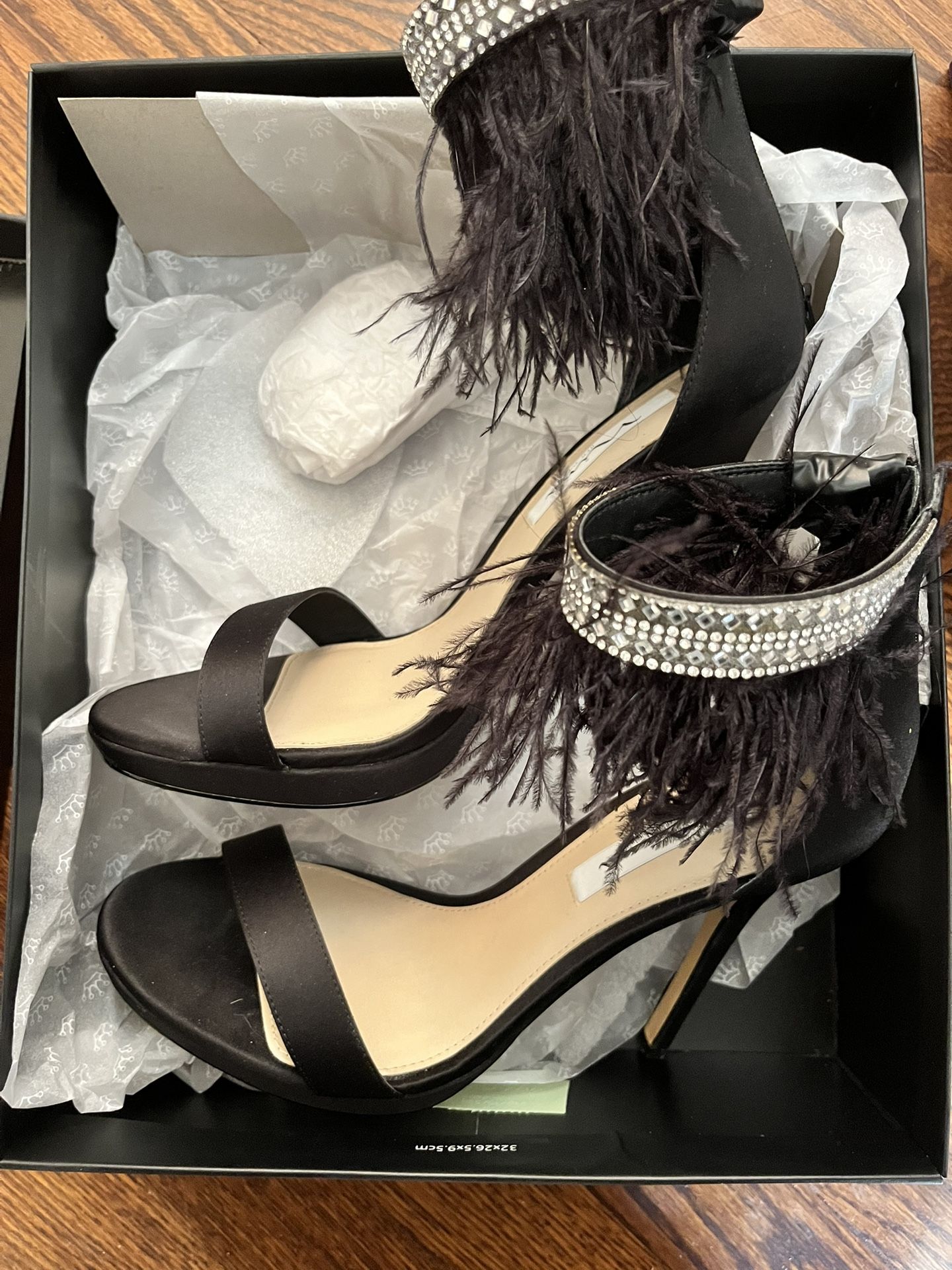 Nina Fran embellished feather sandal in black with a stiletto heel. 9.5 
