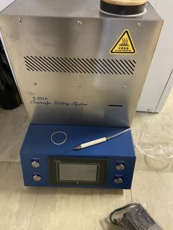 oil cartidge machine barley used like new!!!