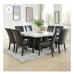 Marble Table With 4 Black Chairs