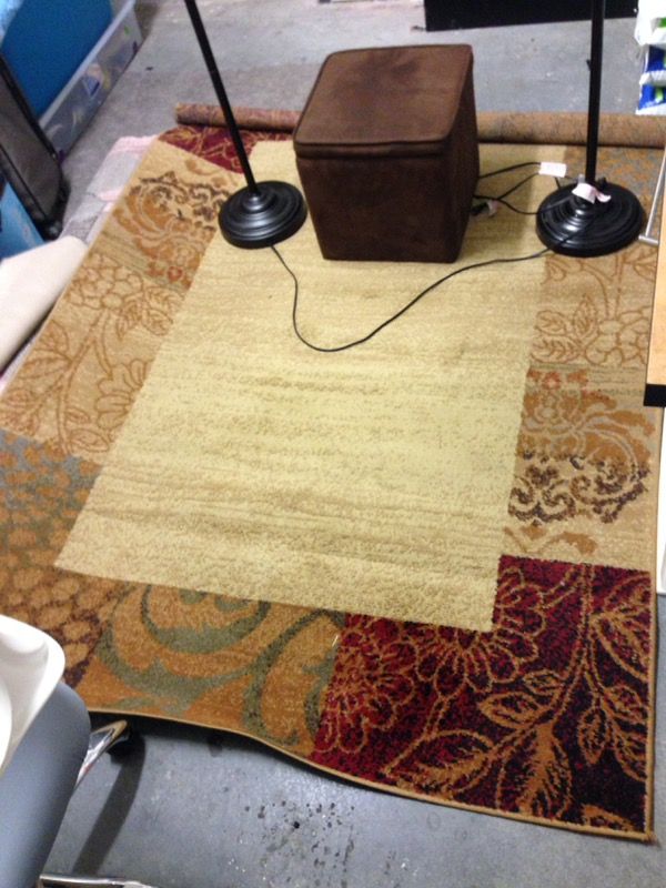 Carpet, ottoman, and two lamps