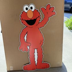 Sesame Street characters stands and backdrop