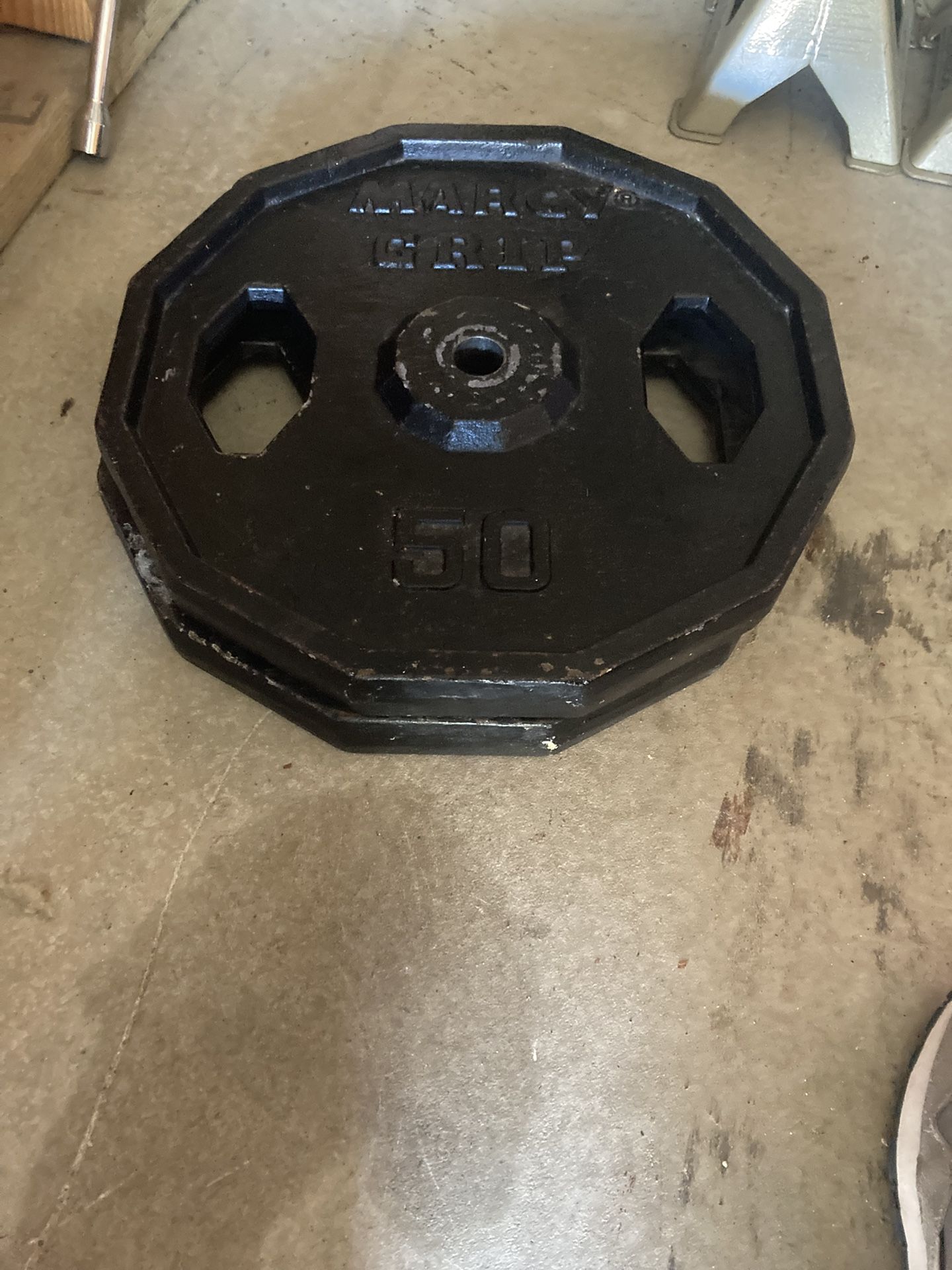 2- 50 Lb Plates(standard)