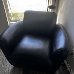 Two Black Armchairs 