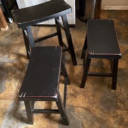 Three wooden stools 