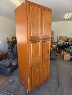 Cabinets, vanity and linen, new