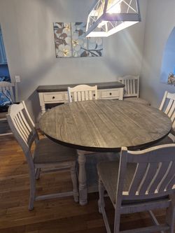 Dining room table with 6 chairs and matching buffet