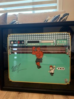 Mike Tyson autographed punch out