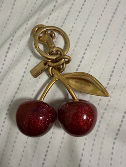 Coach cherry bag charm