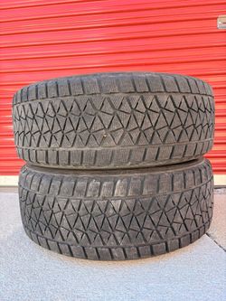255-60-18 / PAIR / BRIDGESTONE BLIZZAKS