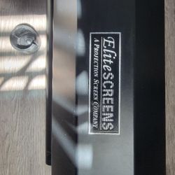 Electric.
Elite screens projection screen