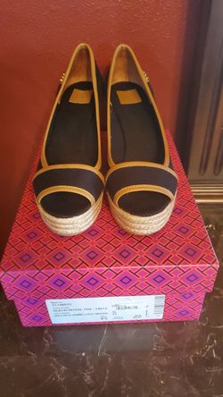 Brand new Tory Burch black royal tan wedges in size 8.5