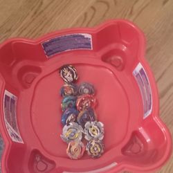 11 beyblades with stadium