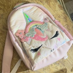 unicorn backpack shown in the image is from OMG Accessories, 