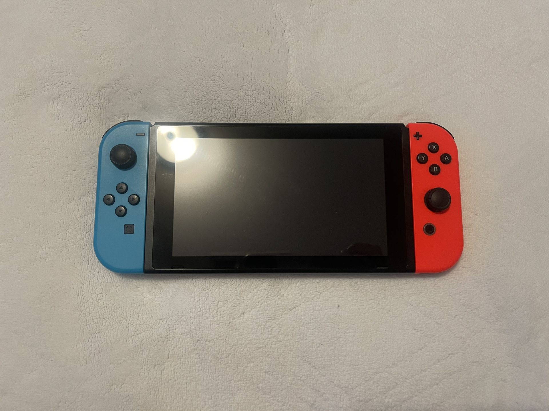 Nintendo Switch With Two Mario Games