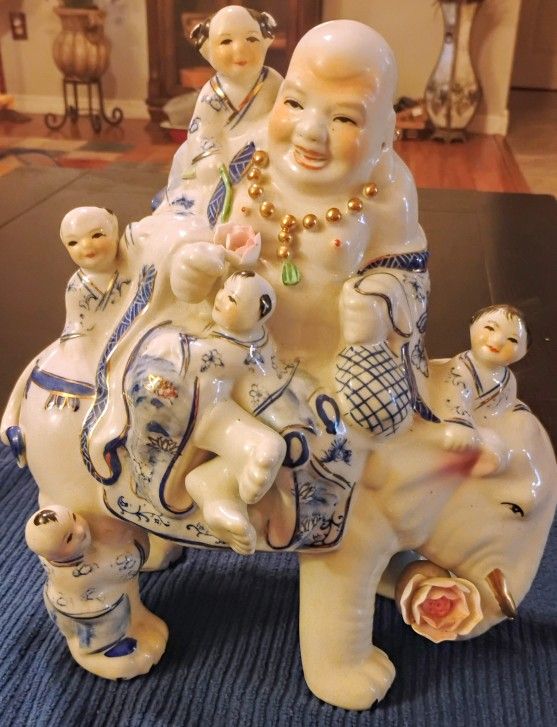 PORCELAIN HAPPY BUDDHA ON ELEPHANT WITH 5 CHILDREN