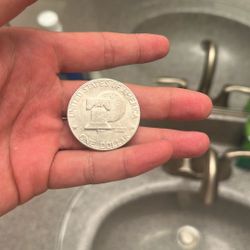 Bi-centennial Ike Dollar Coin