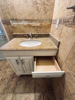 Vanity with faucet 37”
