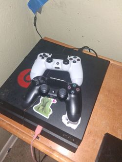 Ps4 with 2 controllers and wires included.