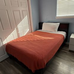 Queen size bed frame + mattress set.
