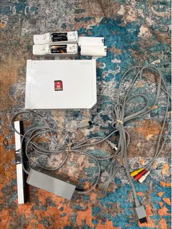 *M* NINTENDO WII W/20 games